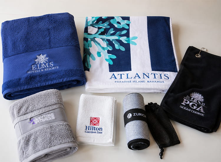 Assorted bath, beach, hand, gym, cooling, and golf towels