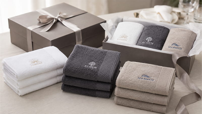 Embroidered hand towels packaged in presentation gift boxes