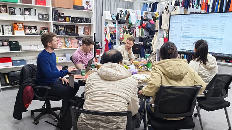 China promotional gift supplier meeting with global buyers to discuss custom products, sourcing solutions, and project requirements