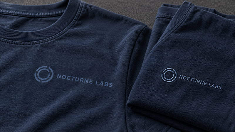 Tone-on-tone T-shirt design using a logo color close to the garment color.